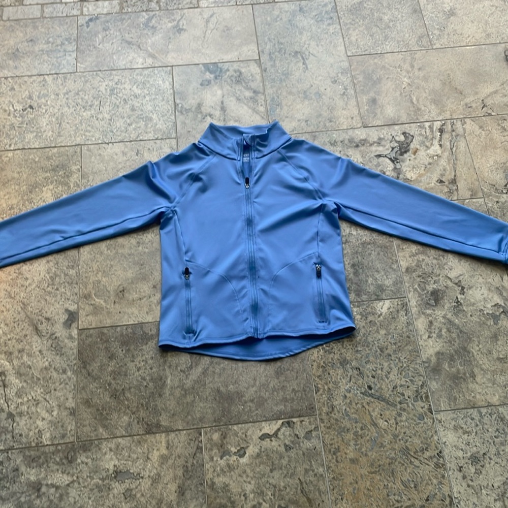 Brand is Zella size L 10/12 and is a pretty light blue
